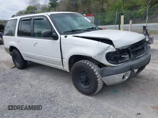 1999 Ford Explorer XLT z VIN 1FMZU34E1XZA39121, wystawiony jako IAAI lot #42107728 z przebiegiem 194 374 mil mil oraz . Historia ofert i sprzedaży dostępna na DreamBid. Obrazek 1.