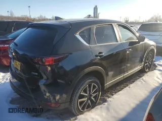 2018 Mazda CX-5 Touring z VIN JM3KFACM9J0300642, wystawiony jako Copart lot #80210854 z przebiegiem 118 309 mil mil oraz Szkoda całkowita • Salvage title. Historia ofert i sprzedaży dostępna na DreamBid. Obrazek 3.