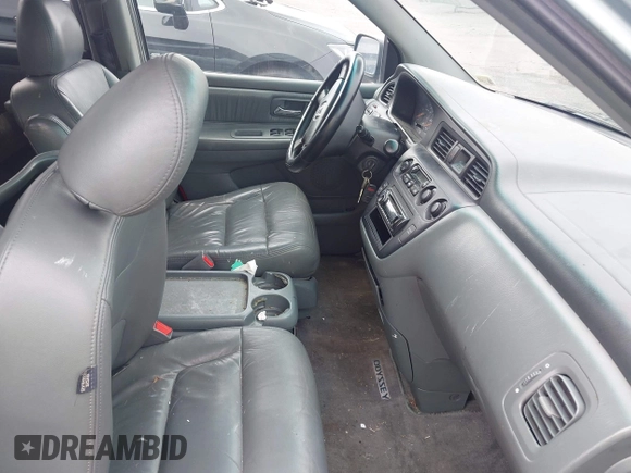 2004 Honda Odyssey EX-L with VIN 5FNRL18974B036430, listed as a IAAI auction lot 42715287 with 230,646 mi miles and . Bid and sale history available at DreamBid. Image 5.