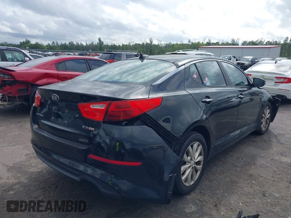 2015 Kia Optima EX z VIN 5XXGN4A72FG354497, wystawiony jako IAAI lot #42110643 z przebiegiem 117 751 mil mil oraz . Historia ofert i sprzedaży dostępna na DreamBid. Obrazek 4.