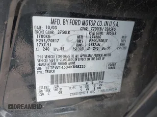 2004 Ford F-150 XLT with VIN 1FTPW14534KB58335, listed as a IAAI auction lot 41863669 with 99,980 mi miles. Bid and sale history available at carsss.com. Image 9.