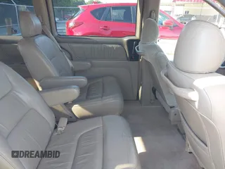2004 Honda Odyssey EX-L with VIN 5FNRL18044B072819, listed as a IAAI auction lot 42441279 with 264,950 mi miles and . Bid and sale history available at DreamBid. Image 8.
