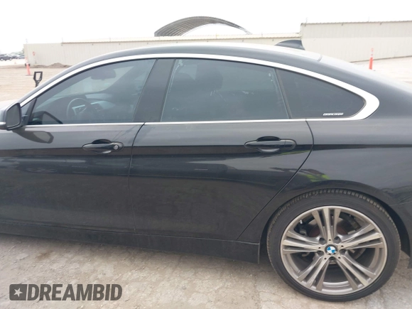 2016 BMW 4 Series 428i with VIN WBA4A9C51GG506512, listed as a IAAI auction lot 41940754 with 144,999 mi miles and . Bid and sale history available at DreamBid. Image 14.
