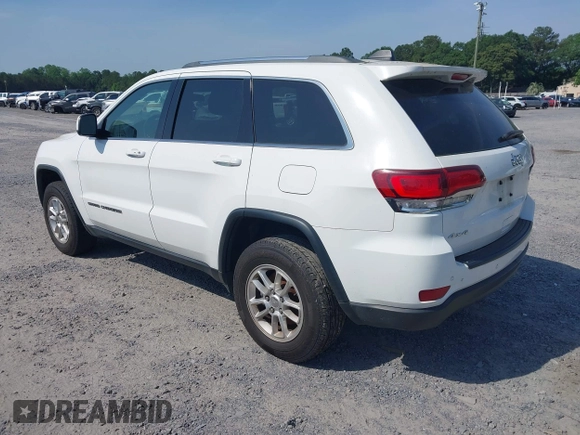 2020 Jeep Grand Cherokee Laredo E with VIN 1C4RJFAG1LC389026, listed as a IAAI auction lot 42261396 with 100,409 mi miles and . Bid and sale history available at DreamBid. Image 3.