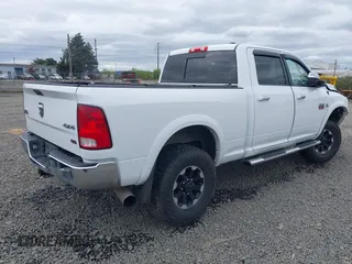 2012 Ram 2500 Big Horn with VIN 3C6UD5DL8CG119834, listed as a IAAI auction lot 39124274 with 197,596 mi miles. Bid and sale history available at carsss.com. Image 4.
