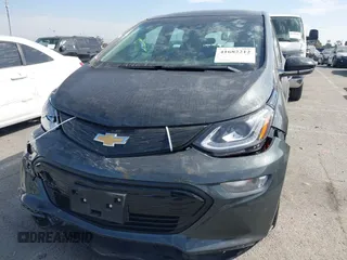 2020 Chevrolet Bolt EV LT z VIN 1G1FY6S0XL4108666, wystawiony jako IAAI lot #41682212 z przebiegiem 34 387 mil mil oraz . Historia ofert i sprzedaży dostępna na DreamBid. Obrazek 6.