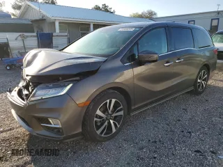 2018 Honda Odyssey Elite with VIN 5FNRL6H98JB087489, listed as a Copart auction lot 51930205 with 149,595 mi miles and Salvage Title. Bid and sale history available at DreamBid. Image 1.