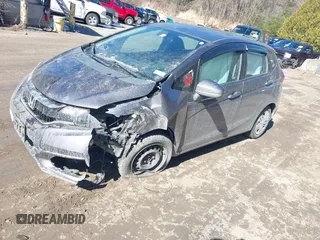 2018 Honda Fit LX z VIN 3HGGK5G44JM716592, wystawiony jako IAAI lot #41878820 z przebiegiem 70 464 mil mil oraz . Historia ofert i sprzedaży dostępna na DreamBid. Obrazek 17.