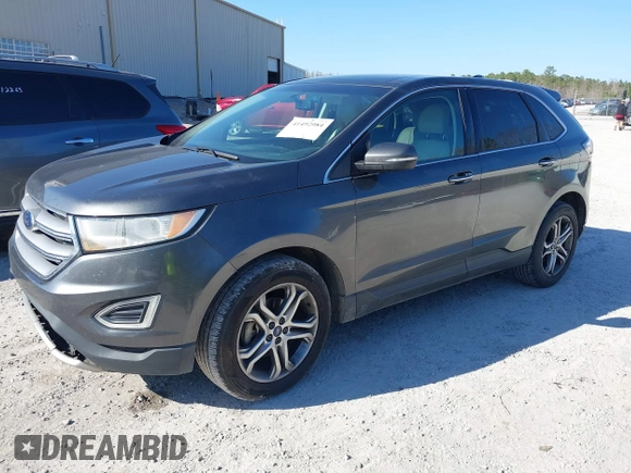 2015 Ford Edge Titanium z VIN 2FMTK3K90FBB13499, wystawiony jako IAAI lot #41492084 z przebiegiem 256 649 mil mil oraz . Historia ofert i sprzedaży dostępna na DreamBid. Obrazek 17.