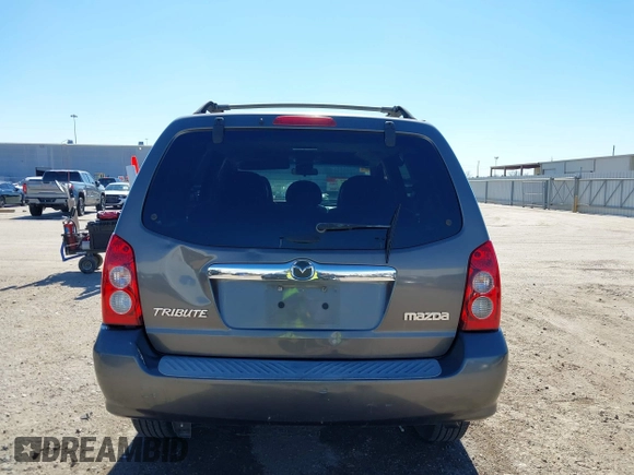 2005 Mazda Tribute S with VIN 4F2CZ06175KM49643, listed as a IAAI auction lot 41397843 with 185,088 mi miles and . Bid and sale history available at carsss.com. Image 16.