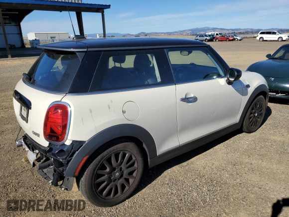 2021 MINI Hardtop Cooper with VIN WMWXR3C07M2N96541, listed as a Copart auction lot 78748714 with 28,706 mi miles and Salvage title. Bid and sale history available at DreamBid. Image 3.