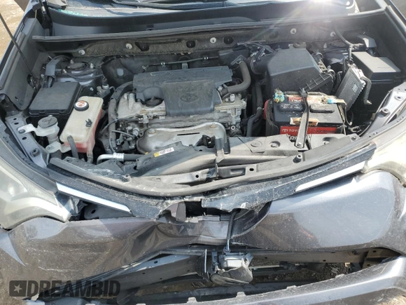 2018 Toyota RAV4 LE z VIN JTMBFREV1JJ219111, wystawiony jako Copart lot #69426224 z przebiegiem 89 555 mil mil oraz Nie do naprawy • Non repairable. Historia ofert i sprzedaży dostępna na DreamBid. Obrazek 14.