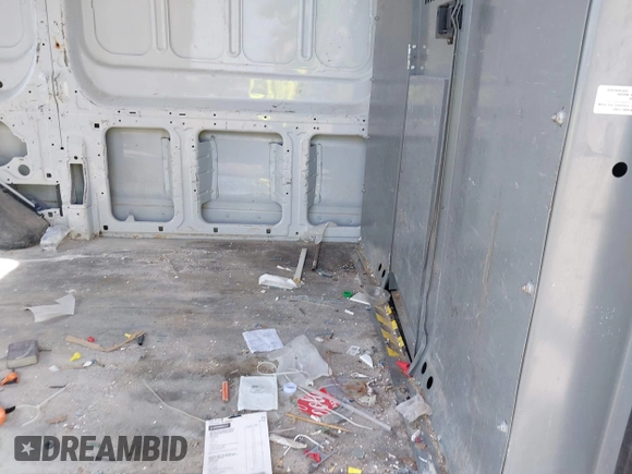 2015 Ford Transit Cargo with VIN 1FTNR1CM2FKB24963, listed as a IAAI auction lot 41455934 with 220,106 mi miles. Bid and sale history available at carsss.com. Image 8.