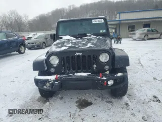 2016 Jeep Wrangler Unlimited Rubicon Hard Rock with VIN 1C4HJWFG4GL118388, listed as a Copart auction lot 45810545 with 97,217 mi miles and Salvage Title. Bid and sale history available at carsss.com. Image 5.