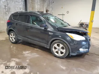2013 Ford Escape SE with VIN 1FMCU9GX5DUA90541, listed as a Copart auction lot 58897585 with 124,593 mi miles and Salvage title. Bid and sale history available at DreamBid. Image 4.