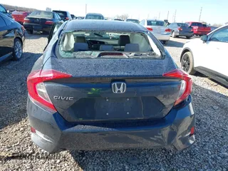 2018 Honda Civic Sedan LX with VIN 19XFC2F58JE016553, listed as a IAAI auction lot 41889434 with 92,045 mi miles. Bid and sale history available at carsss.com. Image 16.
