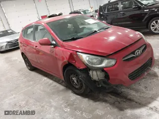 2013 Hyundai Accent GL with VIN KMHCT5AE4DU060854, listed as a IAAI auction lot 41684676 with 112,821 mi miles. Bid and sale history available at carsss.com. Image 1.