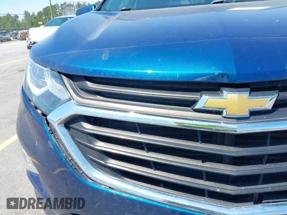 2019 Chevrolet Equinox LT with VIN 2GNAXKEV9K6236308, listed as a IAAI auction lot 42126656 with 106,074 mi miles and . Bid and sale history available at DreamBid. Image 17.