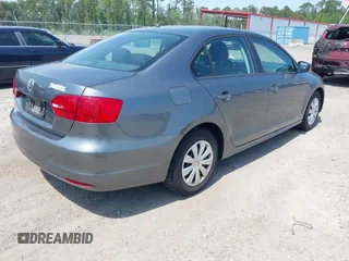 2014 Volkswagen Jetta S with VIN 3VW2K7AJ2EM328671, listed as a IAAI auction lot 42603027 with 156,137 mi miles and . Bid and sale history available at DreamBid. Image 4.