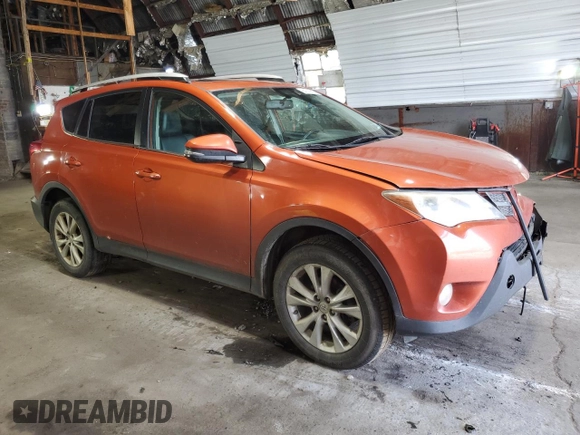 2015 Toyota RAV4 Limited with VIN 2T3DFREV2FW344345, listed as a Copart auction lot 64743615 with 263,042 mi miles and Salvage title. Bid and sale history available at DreamBid. Image 4.