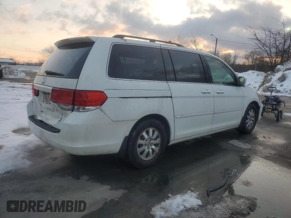 2010 Honda Odyssey EX-L with VIN 5FNRL3H77AB051869, listed as a Copart auction lot 88023625 with 248,511 mi miles and Salvage Title. Bid and sale history available at DreamBid. Image 3.