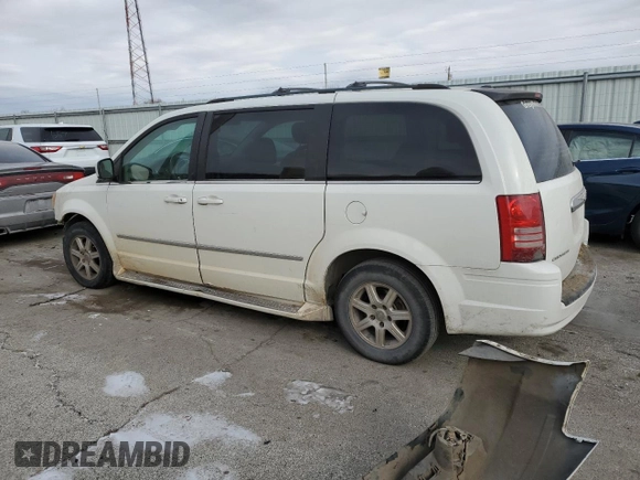 2010 Chrysler Town & Country Touring with VIN 2A4RR5D14AR214357, listed as a Copart auction lot 41743195 with 125,724 mi miles and Salvage Title. Bid and sale history available at carsss.com. Image 2.