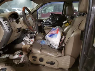 2005 Ford F-150 XLT with VIN 1FTPX14525NB56167, listed as a Copart auction lot 41902755 with 179,417 mi miles and Salvage Title. Bid and sale history available at carsss.com. Image 7.