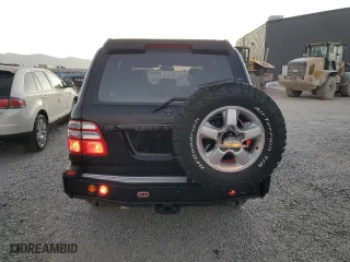 2003 Toyota Land Cruiser with VIN JTEHT05J132049479, listed as a Copart auction lot 74533464 with 218,413 mi miles and Salvage Title. Bid and sale history available at carsss.com. Image 6.