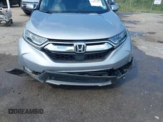2018 Honda CR-V Touring with VIN 7FARW1H90JE012526, listed as a IAAI auction lot 42055078 with 96,098 mi miles and . Bid and sale history available at DreamBid. Image 6.