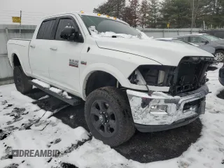 2018 Ram 2500 Laramie with VIN 3C6UR5FJ8JG173113, listed as a Copart auction lot 84708244 with 72,155 mi miles and Salvage title. Bid and sale history available at DreamBid. Image 4.