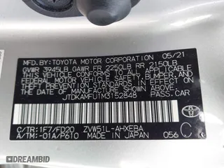 2021 Toyota Prius L Eco with VIN JTDKAMFU1M3152848, listed as a IAAI auction lot 41600212 with 140,114 mi miles. Bid and sale history available at carsss.com. Image 9.