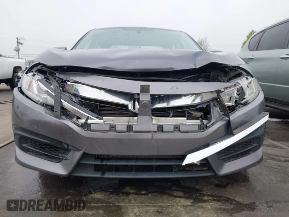 2017 Honda Civic LX z VIN 19XFC2F53HE023730, wystawiony jako IAAI lot #41885003 z przebiegiem 129 595 mil mil oraz . Historia ofert i sprzedaży dostępna na DreamBid. Obrazek 12.