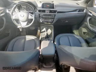 2018 BMW X1 sDrive28i with VIN WBXHU7C31J5H39068, listed as a Copart auction lot 49018985 with 100,611 mi miles and Salvage Title. Bid and sale history available at carsss.com. Image 8.