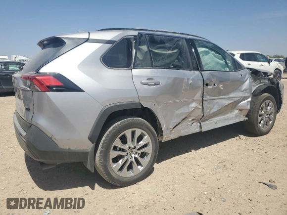 2024 Toyota RAV4 XLE Premium with VIN 2T3C1RFV1RC287814, listed as a Copart auction lot 48802135 with 3,680 mi miles and Salvage title. Bid and sale history available at DreamBid. Image 3.