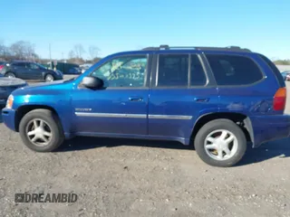 2006 GMC Envoy SLT with VIN 1GKDT13S762170322, listed as a IAAI auction lot 41324540 with 999,999 mi miles. Bid and sale history available at carsss.com. Image 13.