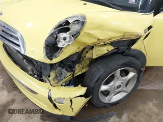 2005 MINI Hardtop with VIN WMWRC33595TJ70125, listed as a IAAI auction lot 42039711 with 178,091 mi miles and . Bid and sale history available at DreamBid. Image 6.