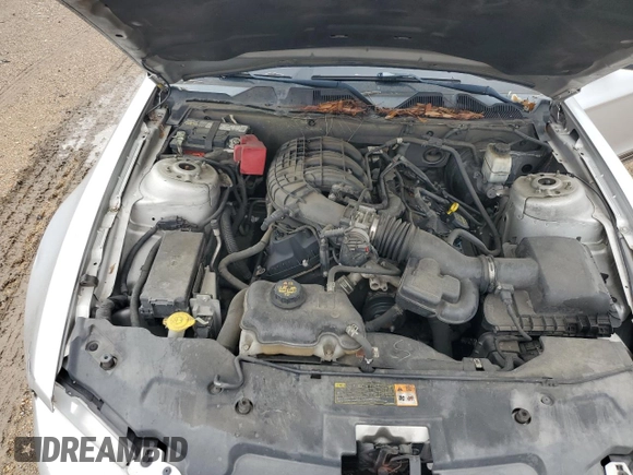 2012 Ford Mustang Premium with VIN 1ZVBP8AM5C5210831, listed as a Copart auction lot 58858065 with 196,564 mi miles and Salvage title. Bid and sale history available at DreamBid. Image 11.