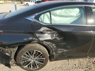 2022 Lexus ES 250 with VIN 58AD11D12NU009293, listed as a Copart auction lot 79694514 with 52,907 mi miles and Salvage title. Bid and sale history available at DreamBid. Image 11.