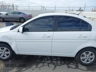 2011 Hyundai Accent GLS with VIN KMHCN4ACXBU619503, listed as a IAAI auction lot 42047496 with 131,135 mi miles. Bid and sale history available at carsss.com. Image 14.