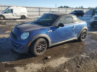 2012 MINI Coupe S z VIN WMWSX3C5XCT465527, wystawiony jako Copart lot #87006534 z przebiegiem 117 822 mil mil oraz Tytuł czysty. Historia ofert i sprzedaży dostępna na DreamBid. Obrazek 1.
