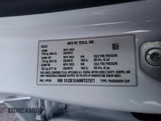 2022 Tesla Model 3 z VIN 5YJ3E1EA6NF237977, wystawiony jako Copart lot #84755374 z przebiegiem 54 645 mil mil oraz Szkoda całkowita • Salvage title. Historia ofert i sprzedaży dostępna na DreamBid. Obrazek 14.