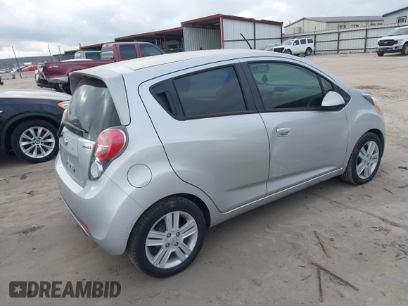 2015 Chevrolet Spark LS with VIN KL8CB6S95FC736907, listed as a IAAI auction lot 42170458 with 102,915 mi miles and . Bid and sale history available at DreamBid. Image 4.