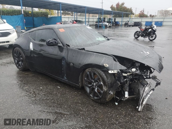 2017 Nissan 370Z z VIN JN1AZ4EH7HM952775, wystawiony jako Copart lot #81940704 z przebiegiem Nie podano mil oraz Szkoda całkowita • Salvage title. Historia ofert i sprzedaży dostępna na DreamBid. Obrazek 4.