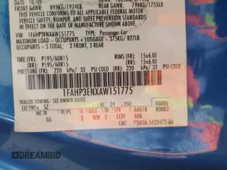2010 Ford Focus S z VIN 1FAHP3ENXAW151775, wystawiony jako Copart lot #57414465 z przebiegiem Nie podano mil oraz Szkoda całkowita • Salvage title. Historia ofert i sprzedaży dostępna na DreamBid. Obrazek 13.