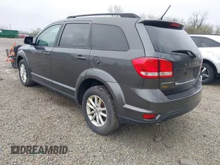 2016 Dodge Journey SXT with VIN 3C4PDCBG9GT137742, listed as a IAAI auction lot 41879431 with 207,443 mi miles. Bid and sale history available at carsss.com. Image 3.