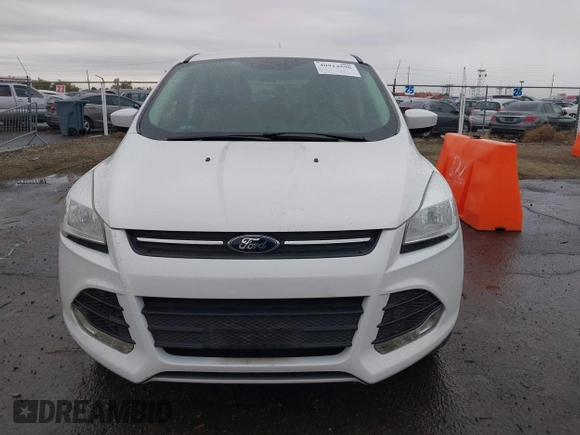 2015 Ford Escape SE with VIN 1FMCU0GXXFUB96076, listed as a IAAI auction lot 40914596 with 134,066 mi miles. Bid and sale history available at carsss.com. Image 6.