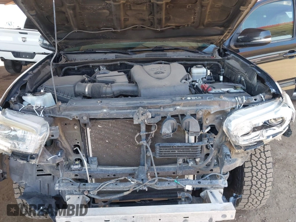 2017 Toyota Tacoma SR5 z VIN 3TMCZ5AN0HM110825, wystawiony jako IAAI lot #42297408 z przebiegiem 126 769 mil mil oraz . Historia ofert i sprzedaży dostępna na DreamBid. Obrazek 10.