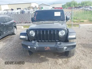 2022 Jeep Gladiator Texas Trail with VIN 1C6HJTAG7NL125006, listed as a IAAI auction lot 42288180 with 96,694 mi miles and . Bid and sale history available at DreamBid. Image 12.