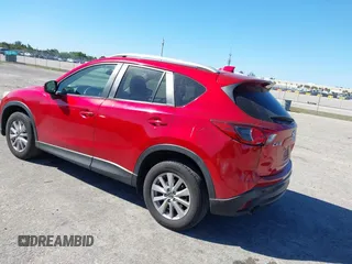 2015 Mazda CX-5 Touring with VIN JM3KE2CY5F0542184, listed as a IAAI auction lot 41770264 with 119,592 mi miles. Bid and sale history available at carsss.com. Image 3.