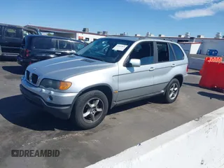 2002 BMW X5 3.0i with VIN 5UXFA53552LV70703, listed as a IAAI auction lot 41957874 with 144,369 mi miles. Bid and sale history available at carsss.com. Image 2.